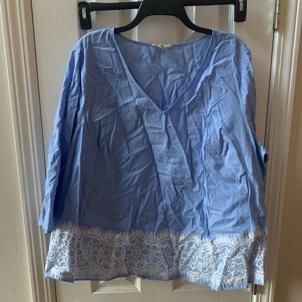 Blouse with trimming